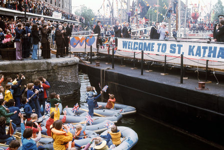 A rousing welcome for Queen Elizabeth II at St Katharine's Dock near the Tower of London, one of the stops on her Silver Jubilee river progress from Greenwich to Lambeth. (AP Photo by kind permission of the Press Association)