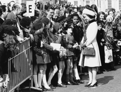 Queen Elizabeth II stops to greet young children on the New London Bridge over the River Thames in London on March 16, 1973